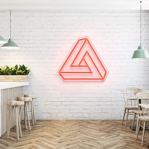 illuminated LED neon sign shown mocked up on wall with clear acrylic backing frame