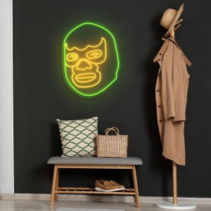 Green illuminated LED neon sign shown mocked up on wall with clear acrylic backing frame